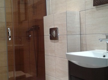 Husarz Władca Łazienką w apartamencie czteroosobowy